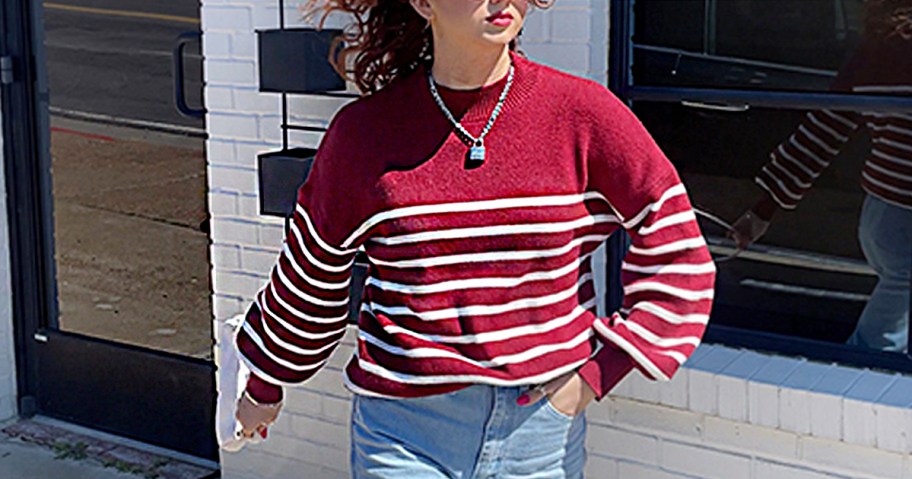 woman wearing red and white striped turtleneck sweater