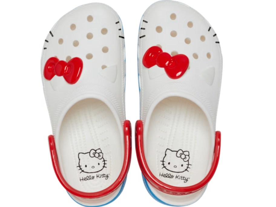 pair of white and red Crocs Hello Kitty style