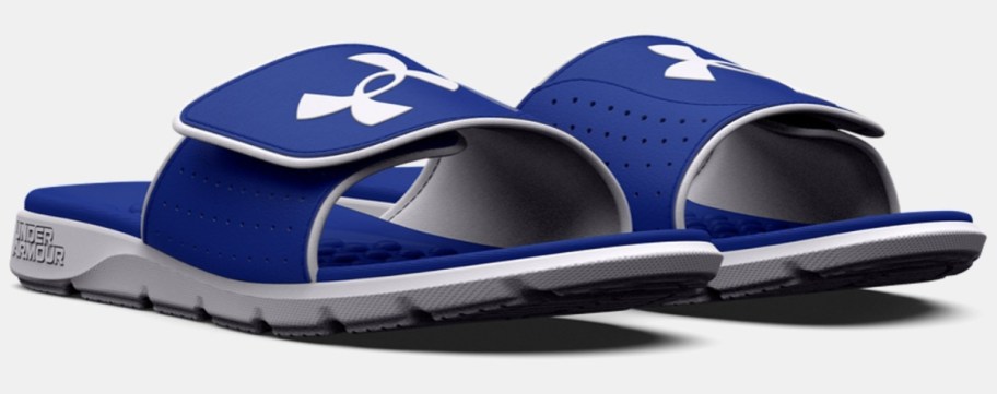 blue and white men's Under Armour Slide