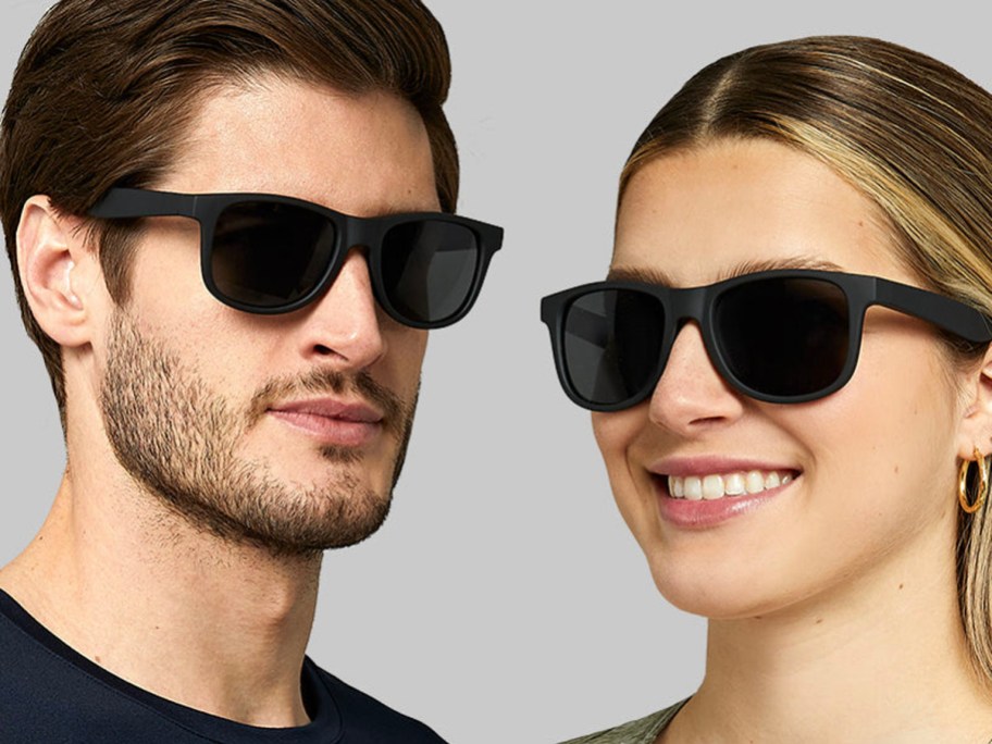 man and woman wearing black round sunglasses