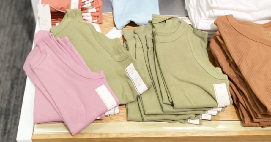 women's tank tops on store display table