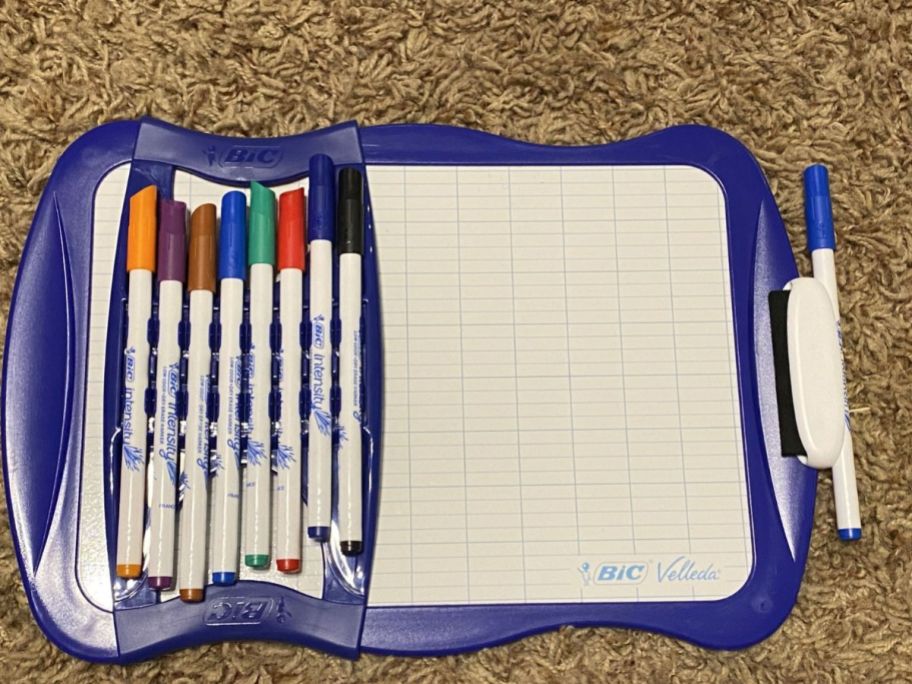 A BIC Dry Erase Board with markers