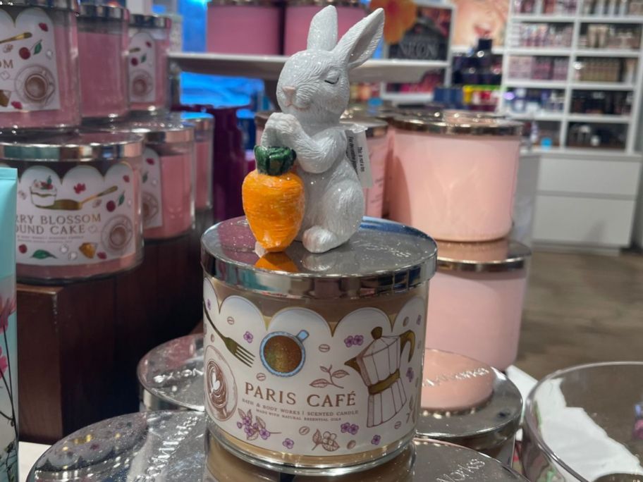 A Bunny jar topper on a Bath & Body works 3-wick candle