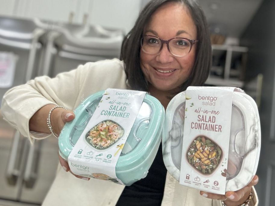 Woman holding 2 Bentgo salad containers
