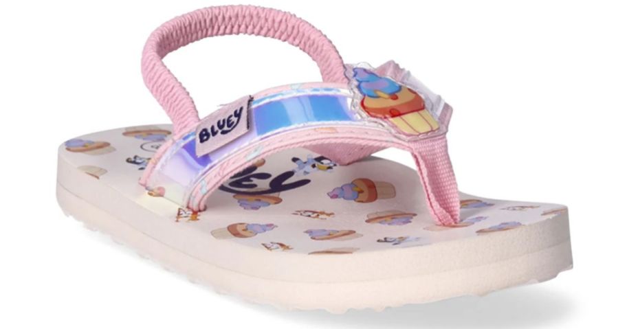 a pink and white toddler girls flipflop with heel strap