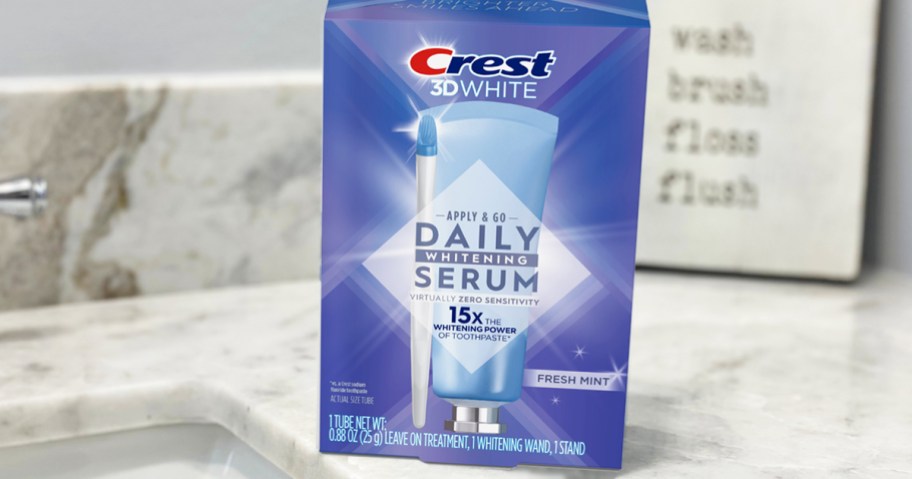 Crest 3D White Daily Whitening Serum on bathroom counter