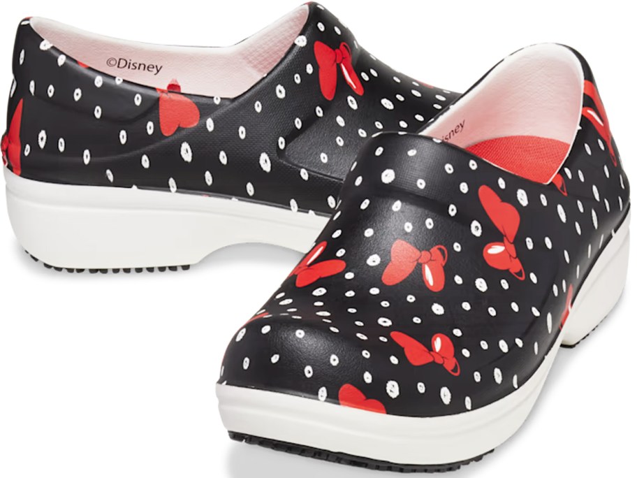 black clogs with white polka dots and red minnie mouse bows