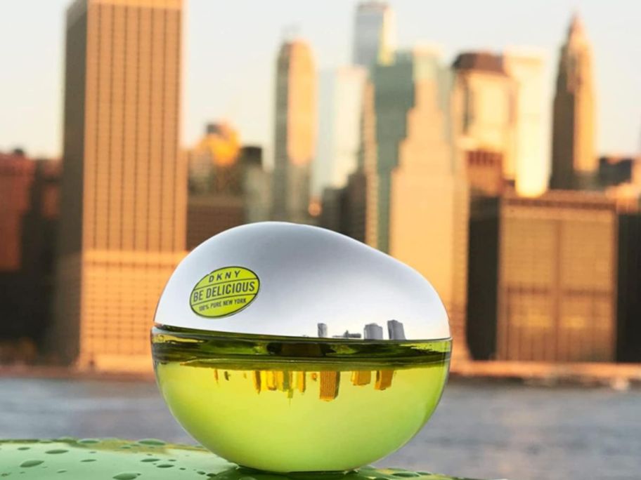 DKNY Be Delicious perfume with NYC in the background