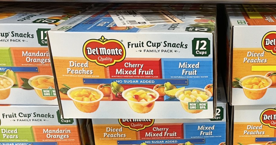 12-count variety pack boxes of Del Monte Fruit Cups on store shelf