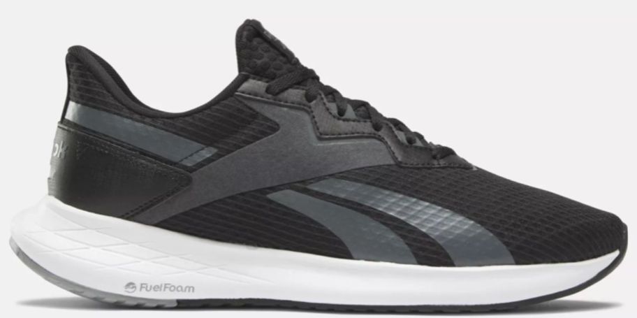 a black mens reebok sneaker with a white sole