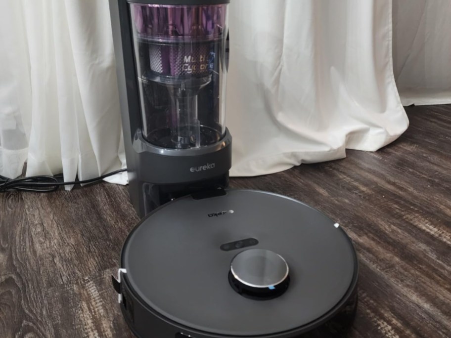 Eureka self cleaning vacuum with station on the floor