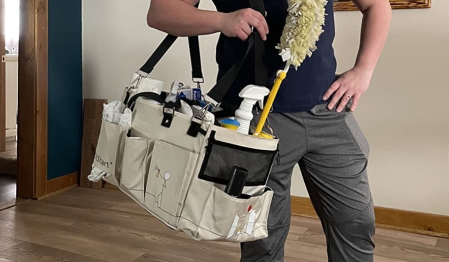 person wearing fifthstart cleaning caddy full of cleaning supplies