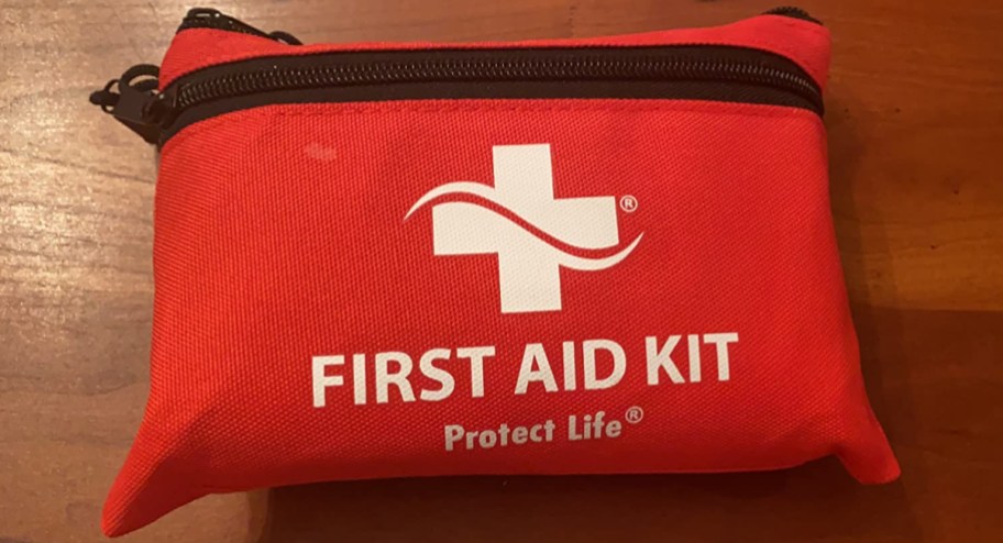 First aid kit pouch displayed on the floor