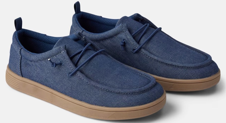 pair of navy blue slip on sneakers