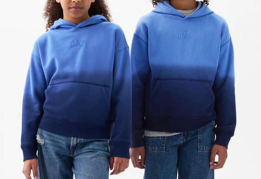 two kids wearing matching ombre blue hoodies