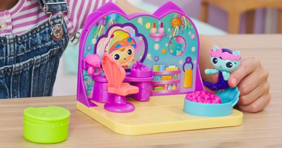 Gabby's Dollhouse: MerCat's Spa Room Playset on table