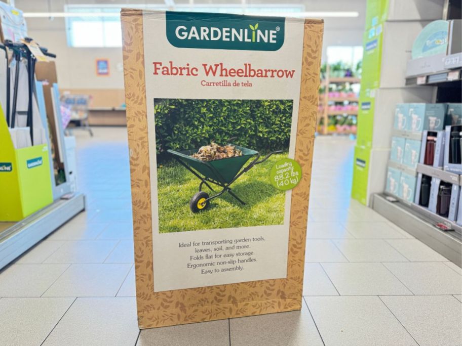 A Gardenline Fabric Wheelbarrow in a box in the store