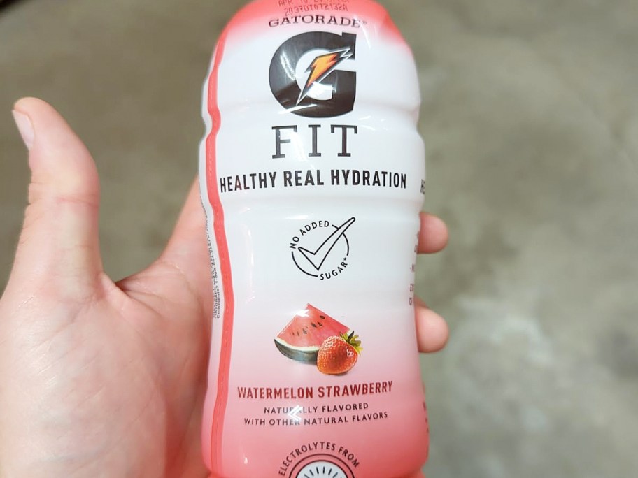 hand holding a bottle of Gatorade Fit in watermelon strawberry flavor