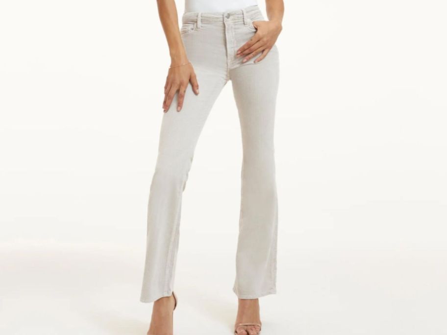 stock image of a woman wearing good american corduroy pants
