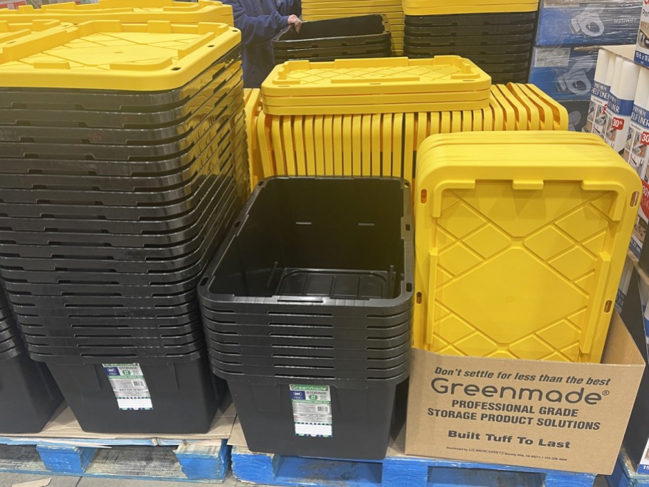 greenmade containers with yellow lids stacked in costco store