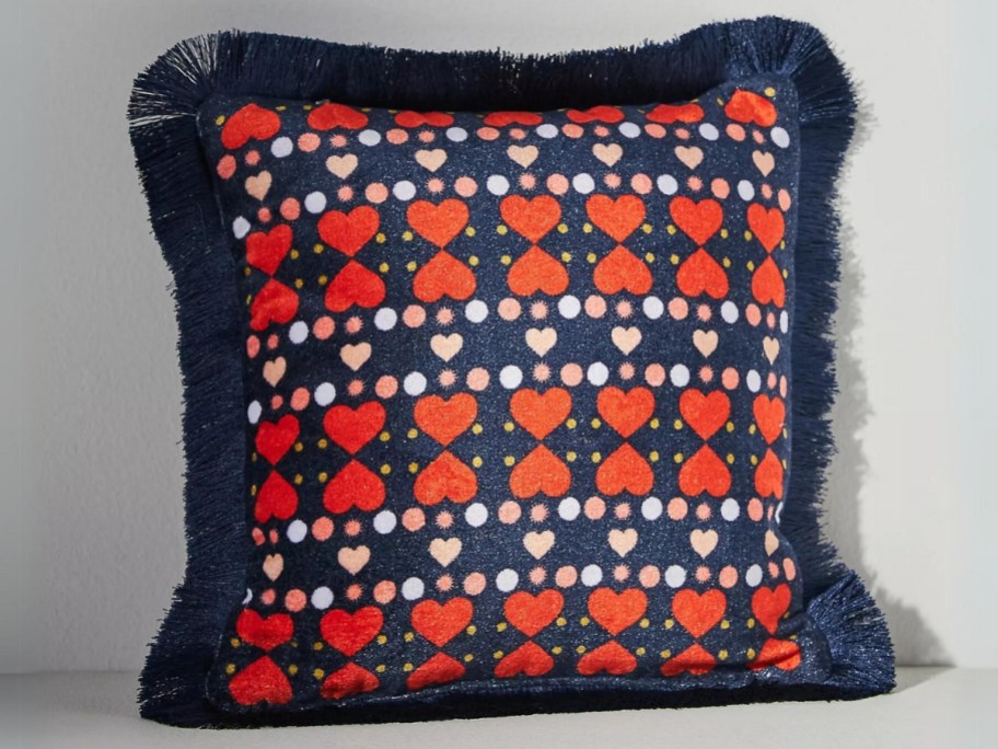 red and blue fringe pillow with hearts, 
