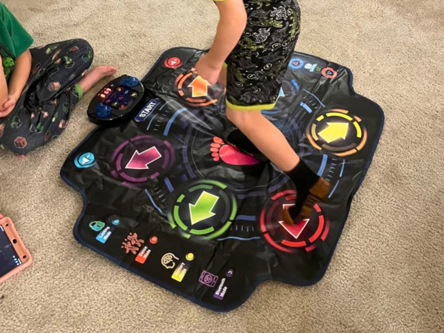kid dancing on a small Electronic Dance Mat