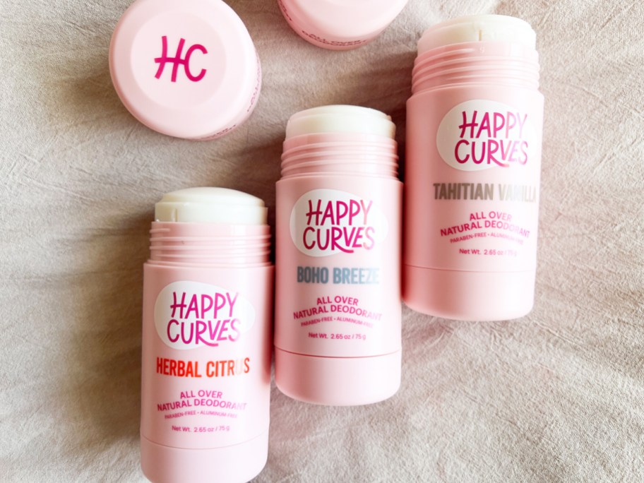 three sticks of happy curves deodorant