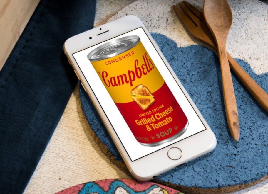 Phone showing a can of campbells grilled cheese and tomato soup