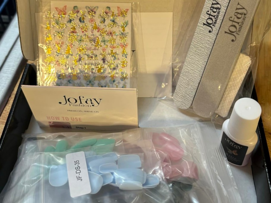 Jofay nail kit with items inside of the box