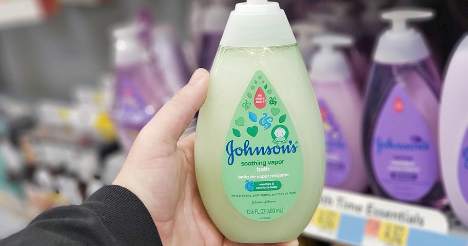 hand holding green bottle of Johnson's Baby Vapor Bath
