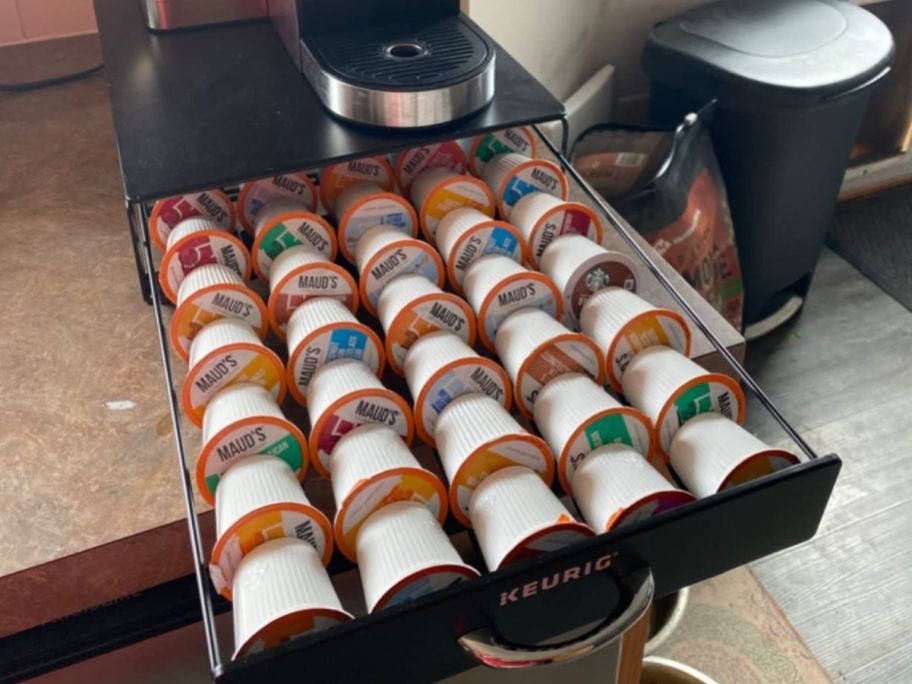 A Keurig Storage Drawer on a counter filled with K-cups