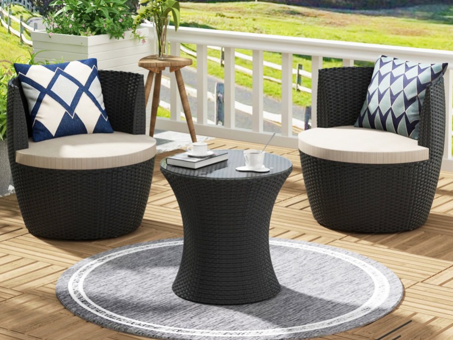black wicker patio seating with with matching side table