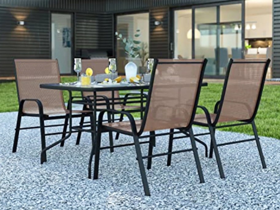 brown and black outdoor patio table and chairs set