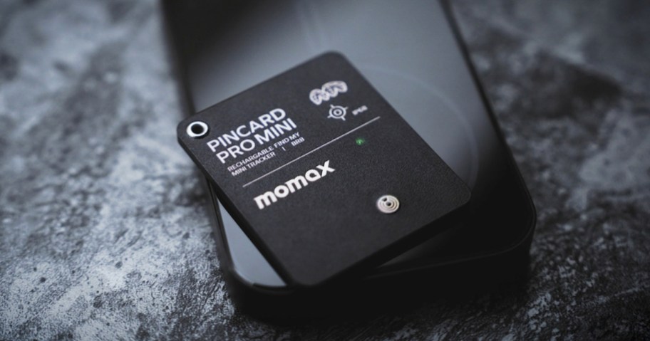 black momax tracker card on wireless charger