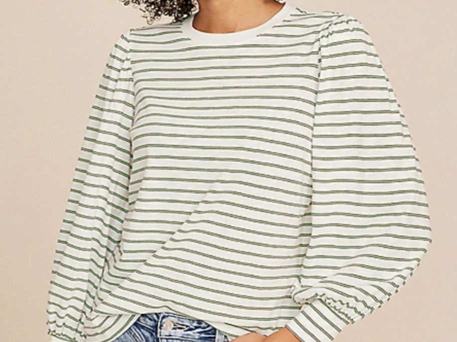 Stock image of a woman wearing a Hadley striped tee from Maurices