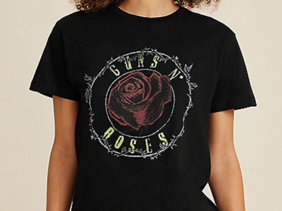 Woman wearing a Guns n Roses Graphic tee from Maurices
