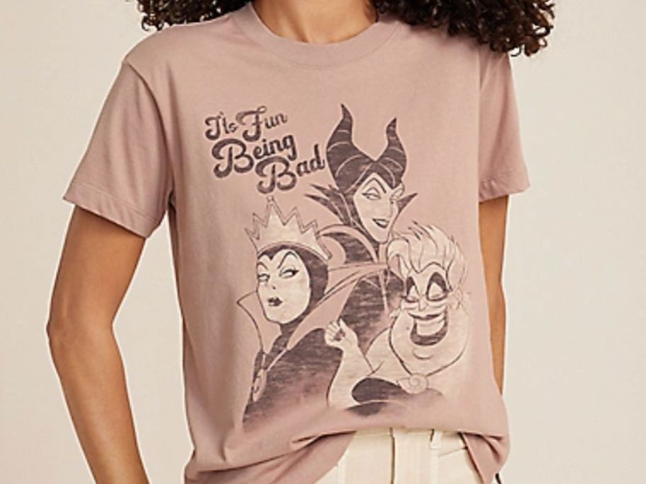 Woman wearing a Disney Villains graphic tee from Maurices