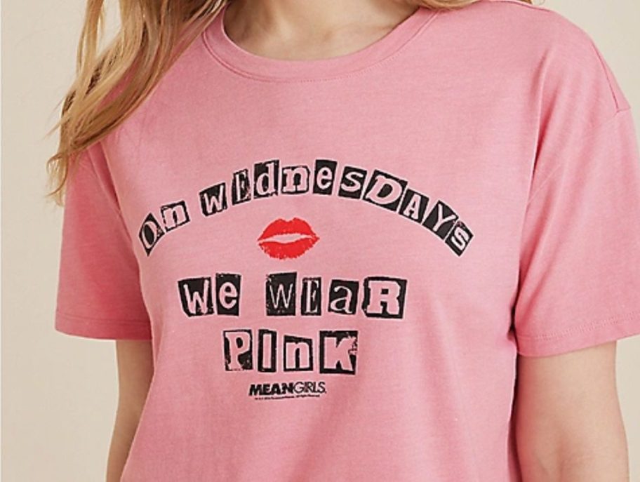 Woman wearing a Pink Mean Girls graphic tee from Maurices