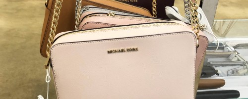 Michael Kors Crossbody Bags on display in store