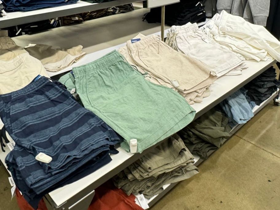 Old Navy Boy's Shorts folded on a table at the store