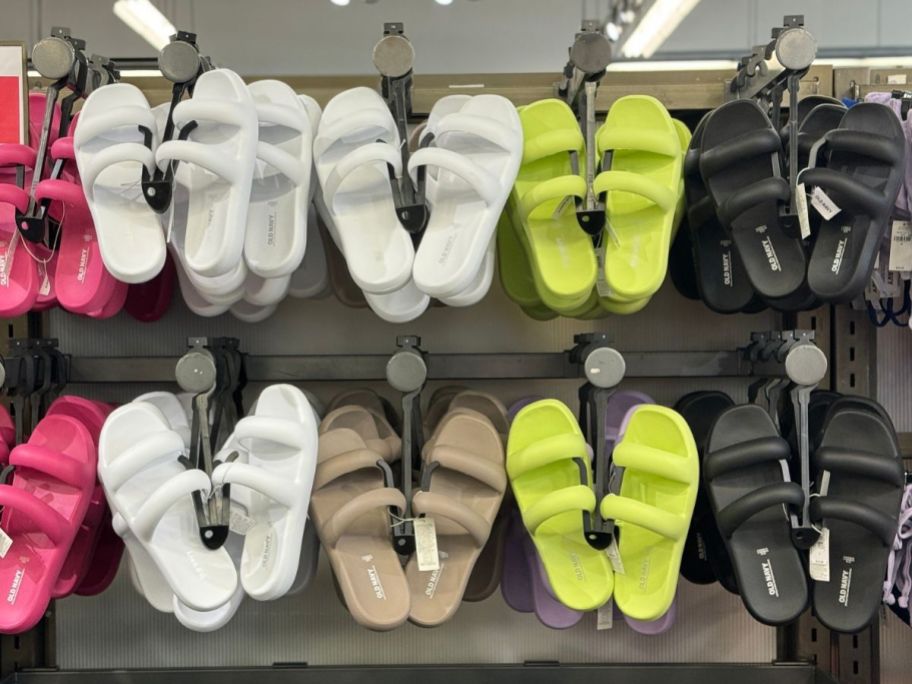 A rack of Old Navy Women's Double Strap Puff Sandals in different colors