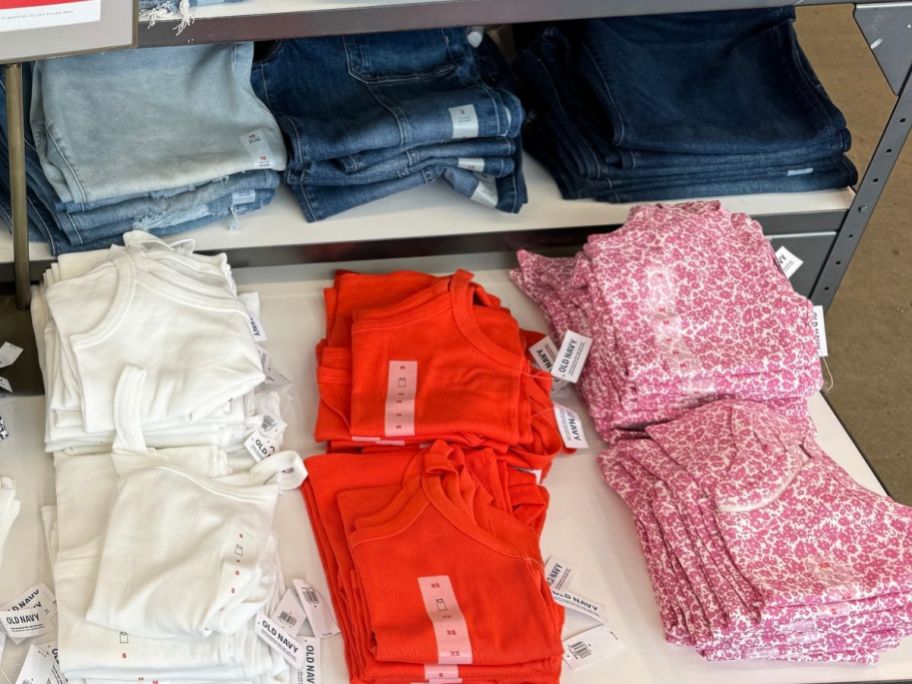 A table of women's ribbed tank tops at old navy