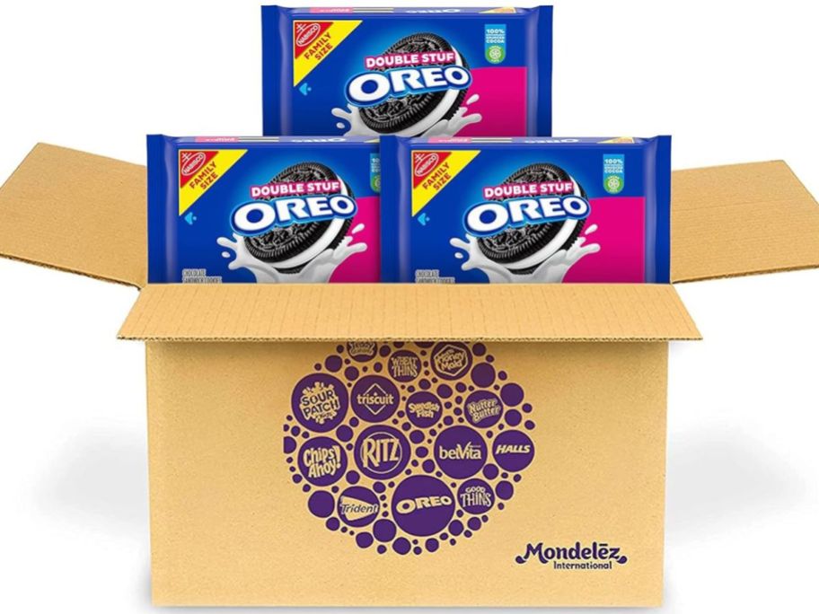 Stock image of a shipping box with 3 familu size boxes of oreo cookies