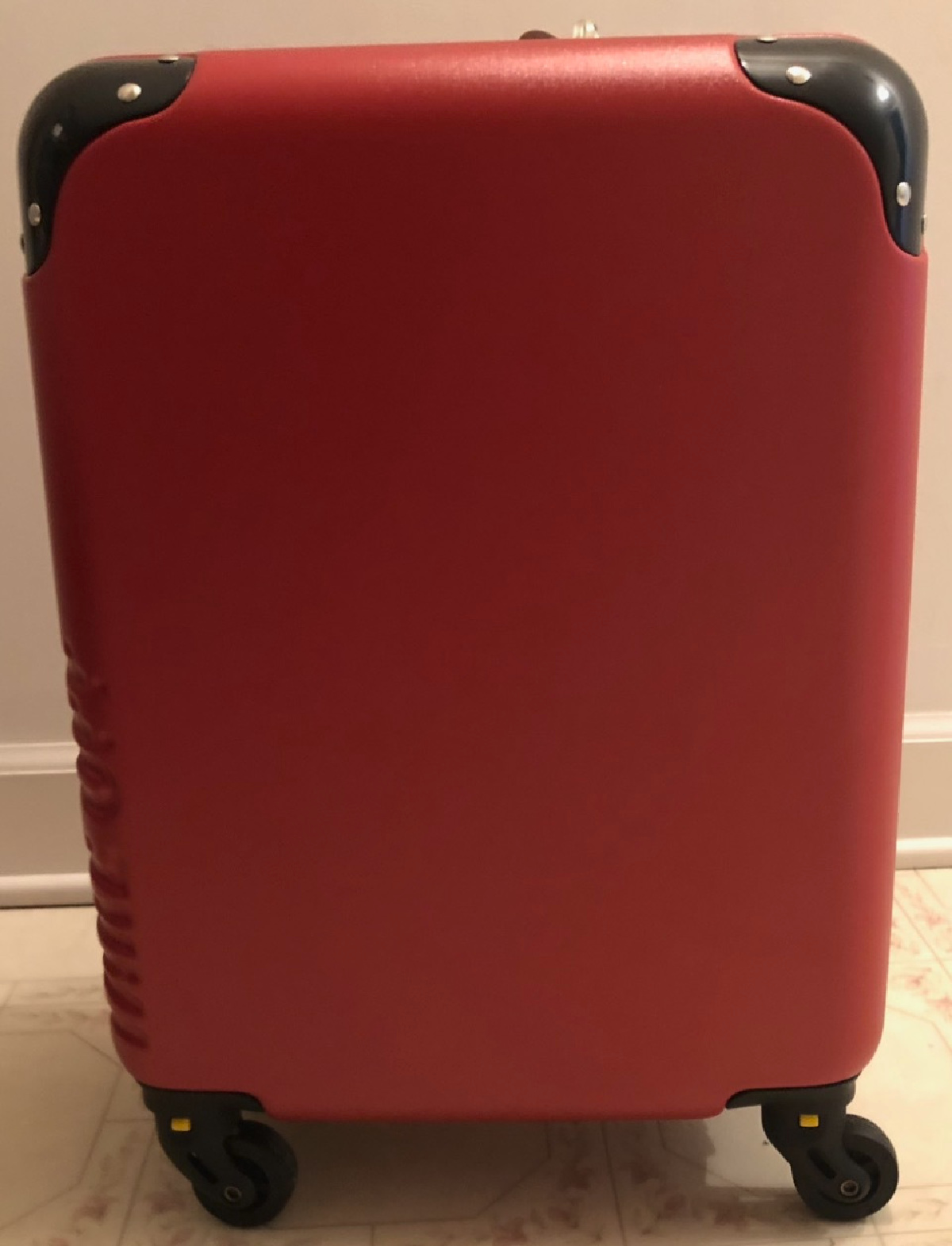 A red suitcase belonging to our Happy Friday reader,. Chris