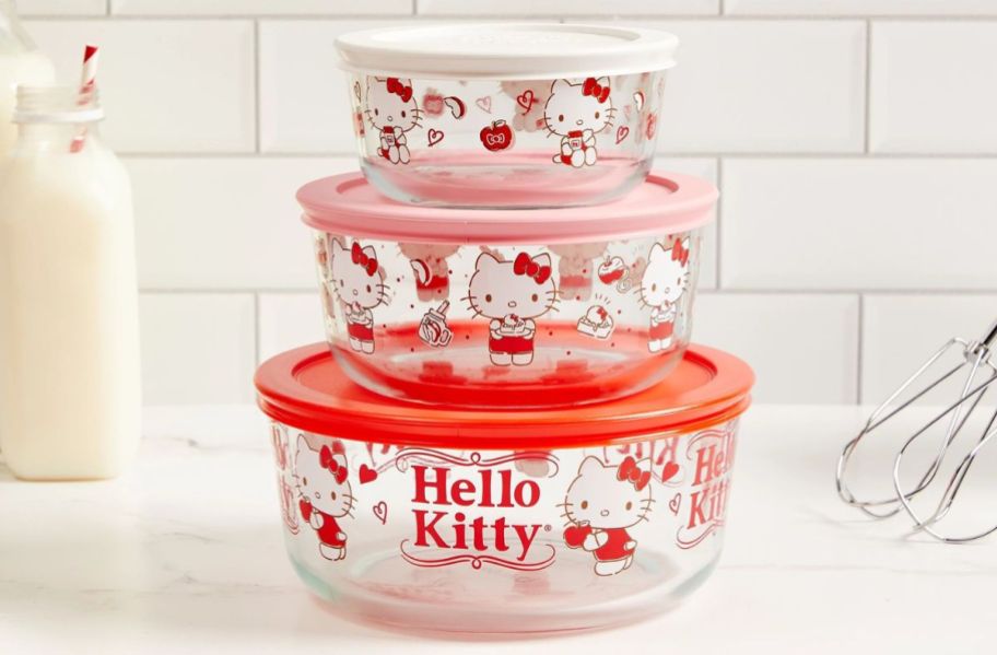  3 piece hello kitty pyrex food storage bowls in a stack