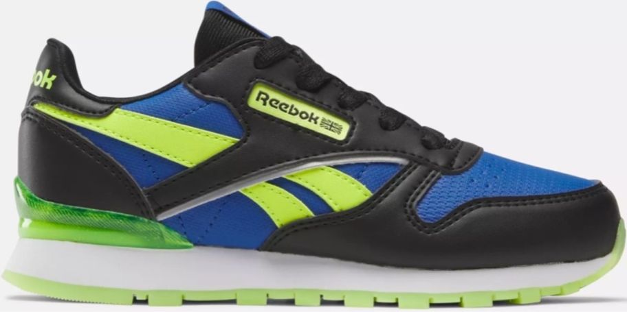a black, navy blue and lime green kids sneaker