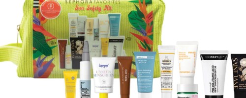 Green cloth beauty bag with travel size sunscreen products