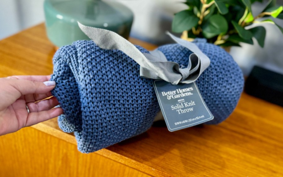 A blue throw blanket from Better homes and Gardens