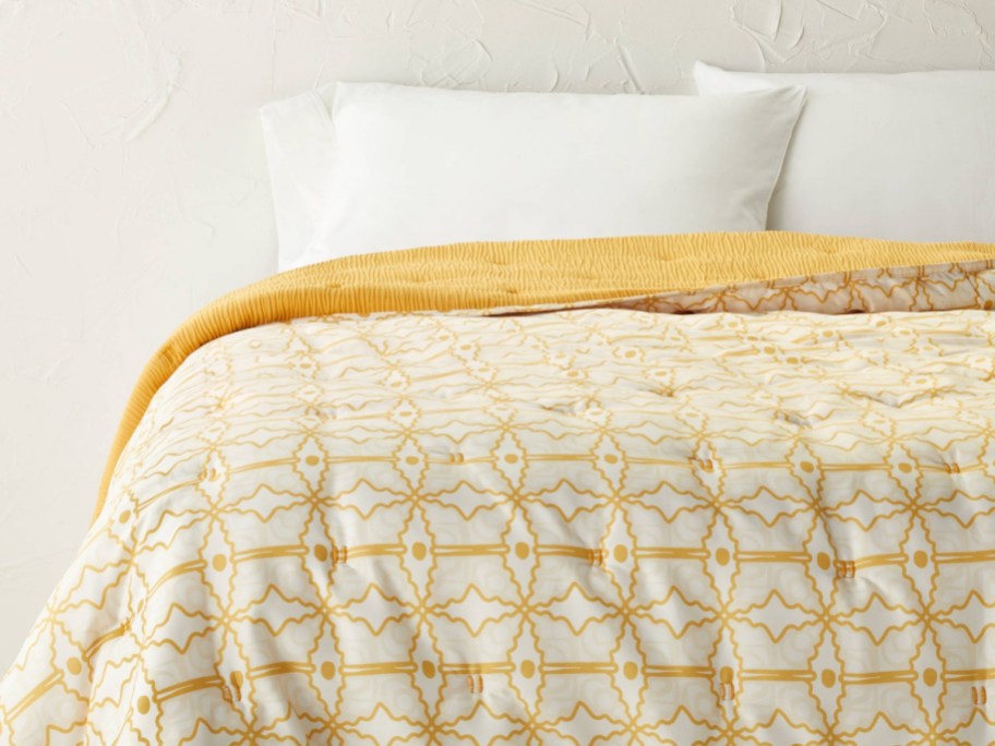 Stock image of quilt bedding set with pattern