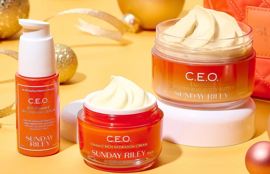 3 orange jars of Sunday Riley vitamin c products